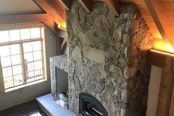 New-Hampshire-Cottage-Canadian-Timberframes-Construction-Great-Room-Fireplace
