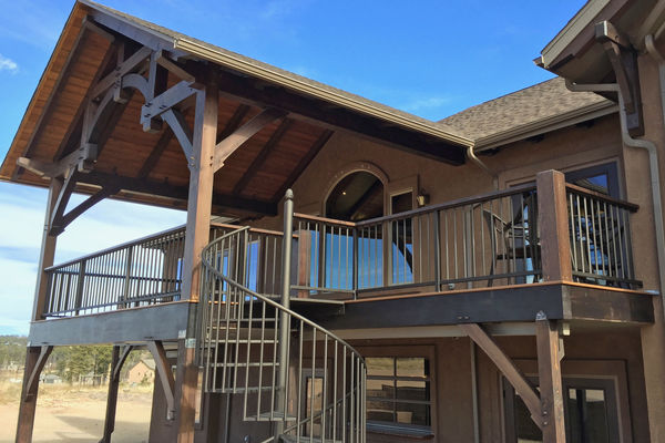 Black-Forest-Timber-Frame-Home-Colorado-Canadian-Timberframes-Covered-Deck
