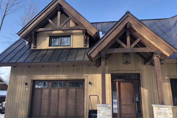 Bromont-Timber-Frame-Home-Quebec-Canadian-Timberframes-Completed-Front-Exterior