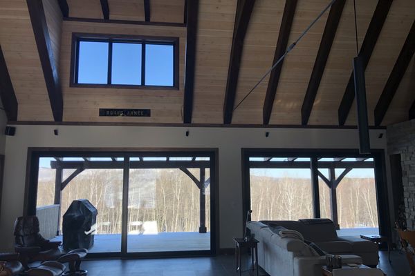 Bromont-Timber-Frame-Home-Quebec-Canadian-Timberframes-Completed-Exterior-Deck